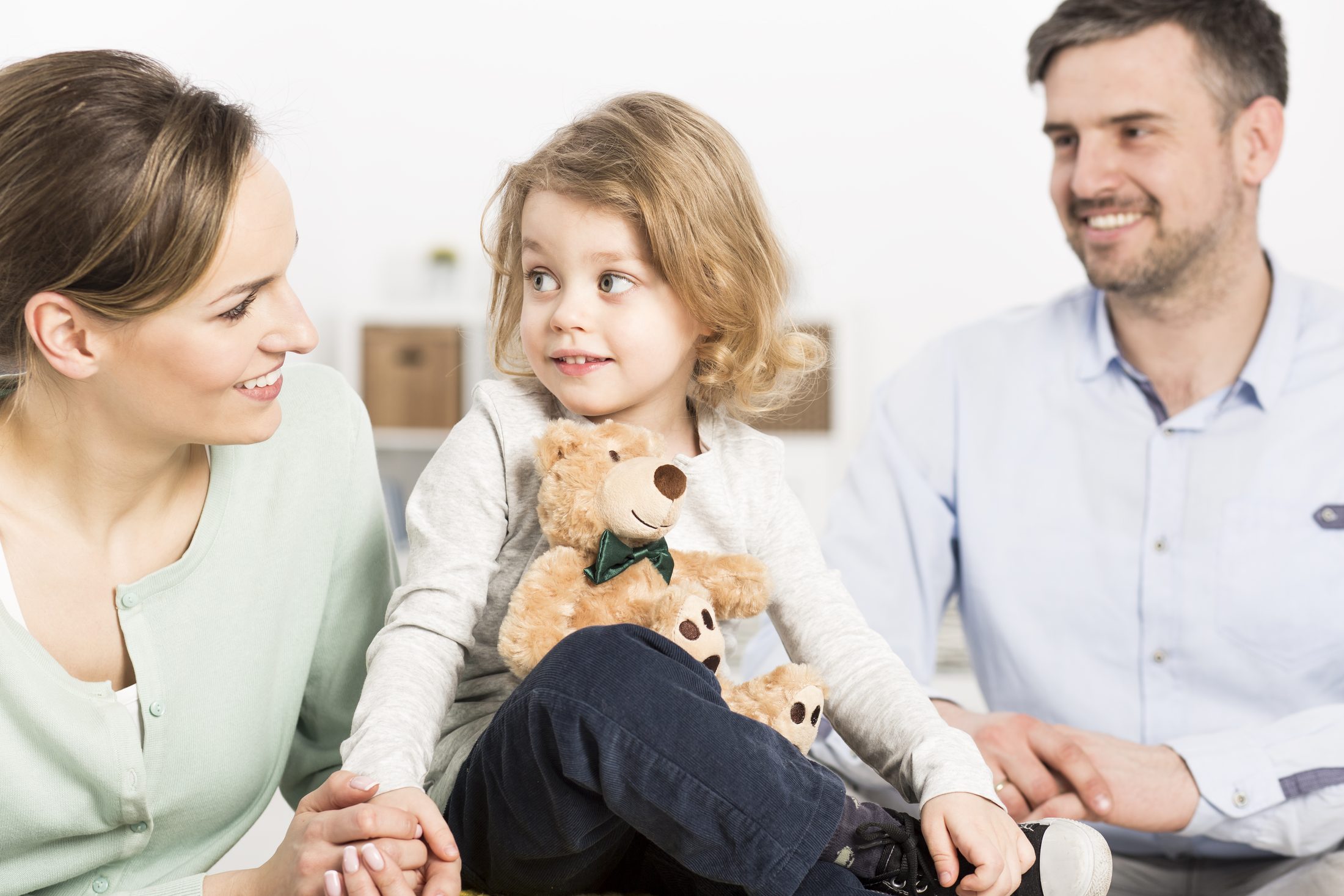 Parents and child together after agreeing parenting arrangements through family mediation in Orange